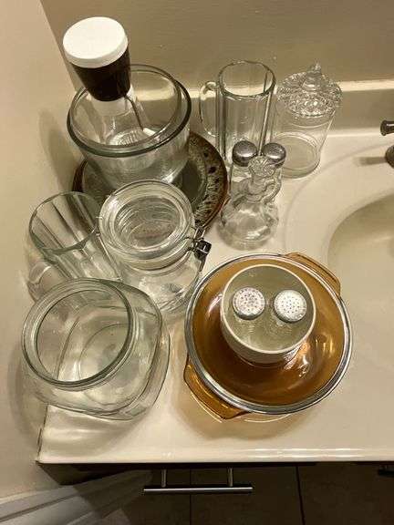 Canisters, chopper, stoneware plates, biscuit jar, salt & pepper image