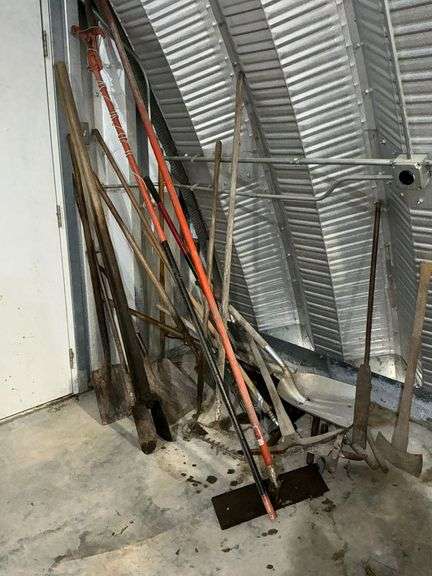 Long handled tools, shovels, leaf rakes image