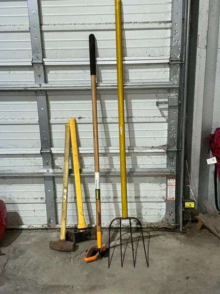 Long handled tools, sledge hammer, axe, Fiskars limb saw image