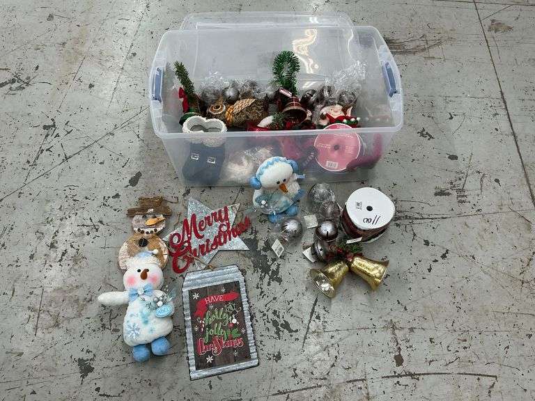 Tote of Christmas decorations, snowmen, elf, bells, signs image