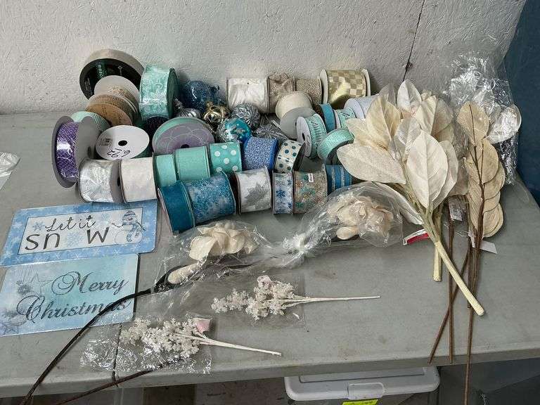 Large assortment of teal and white wired ribbon, ornaments and floral picks image