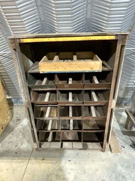 Wooden shelf and metal storage bins image