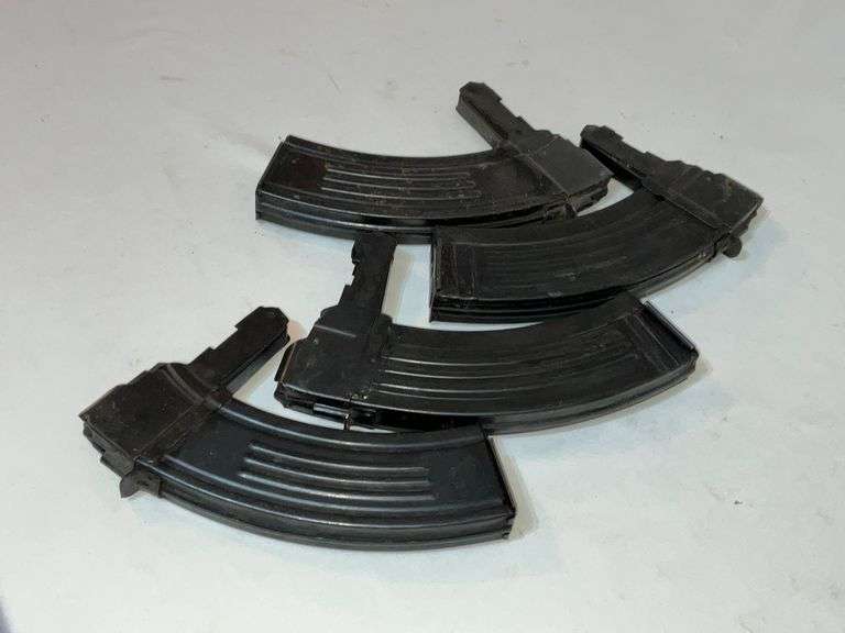 4 unmarked magazines