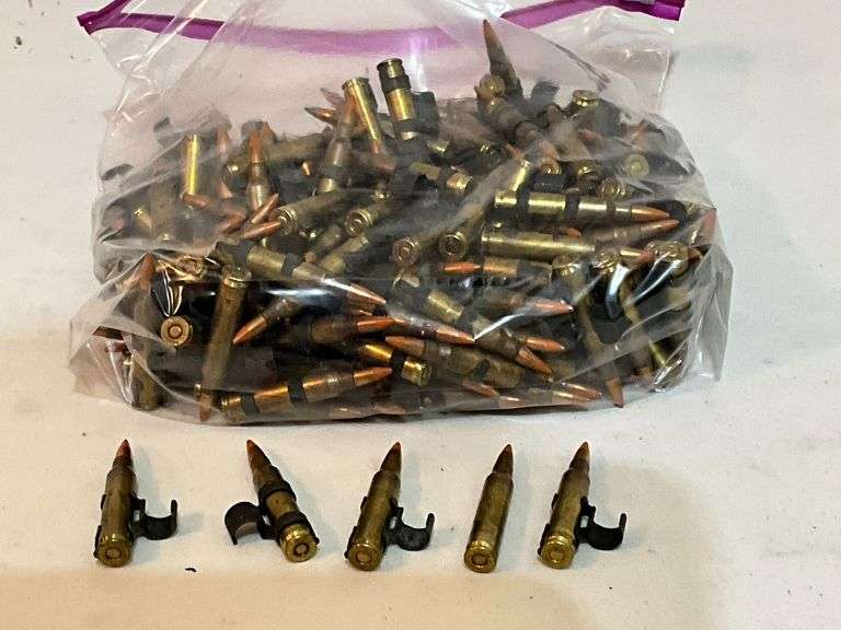 Military ammo 5.56, orange tips, 250 rounds +/-.