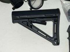 Scope covers, grips, MAG pull grip and part of stock butt