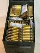 Metal ammo can with 1000 +/- rounds of 5.56 green tips on zipper clips.