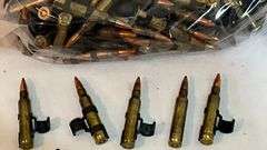 Military ammo 5.56, orange tips, 250 rounds +/-.