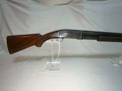 Remington 12 gauge pump action shotgun