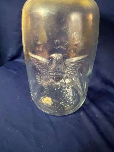 Mason's large glass jar with bail handle, cracked plastic lid
