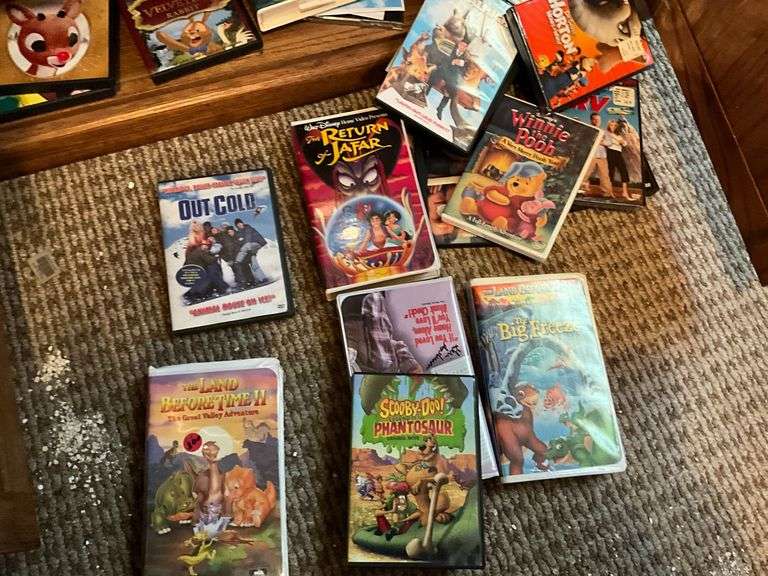 Assortment of VHS & DVD movies image