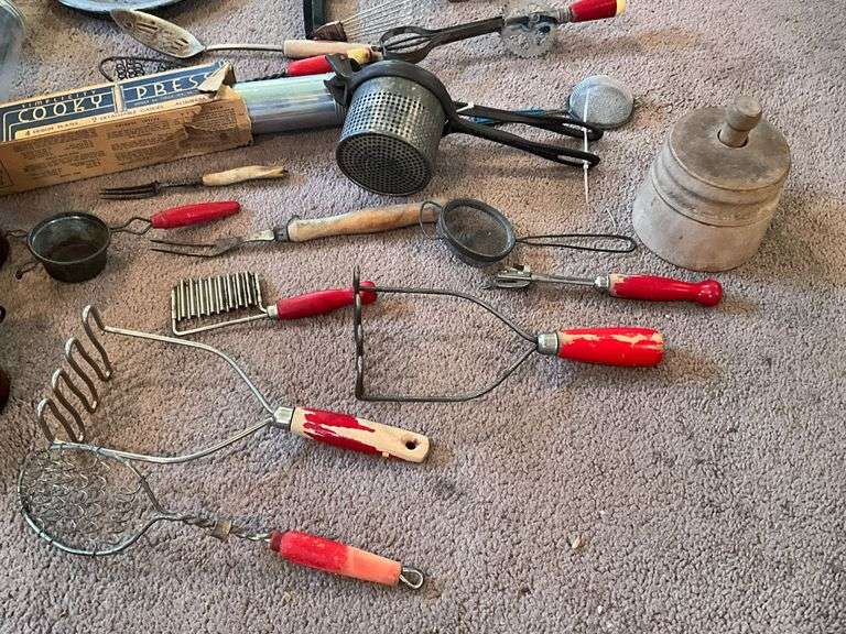 Vintage kitchen utensils, strainers, crocks