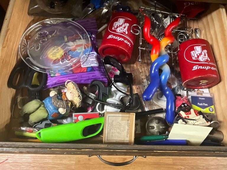 Contents of junk drawer, Snap-On cup cozies, candles image