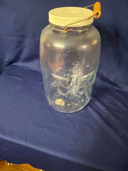 Mason's large glass jar with bail handle, cracked plastic lid image