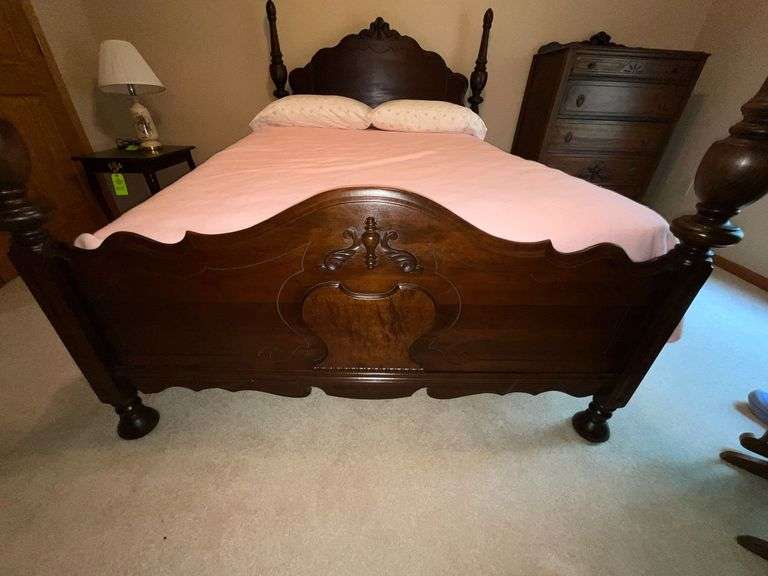 Antique four-poster bed, damage to one side rail