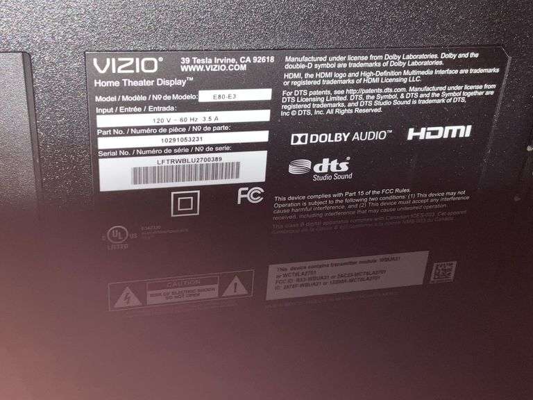 Vizio flatscreen Smart TV with remote and stand