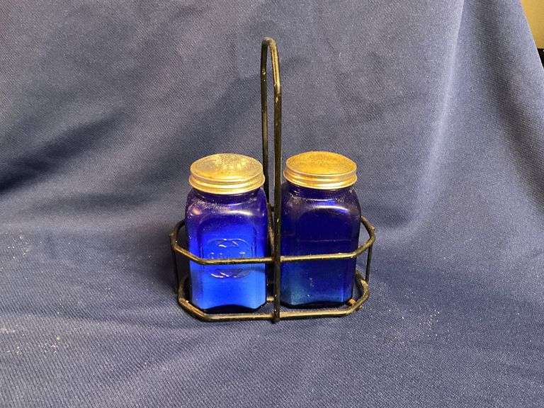 Cobalt blue salt & pepper shakers in wire caddy image