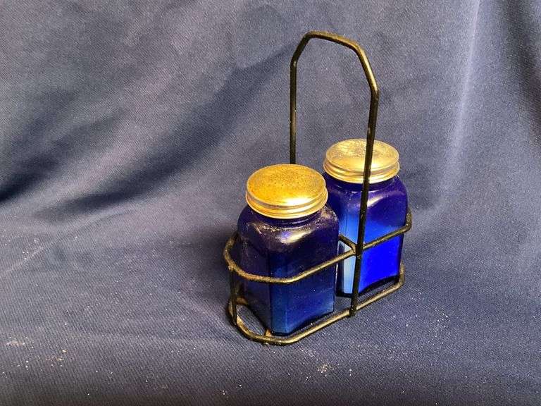Cobalt blue salt & pepper shakers in wire caddy