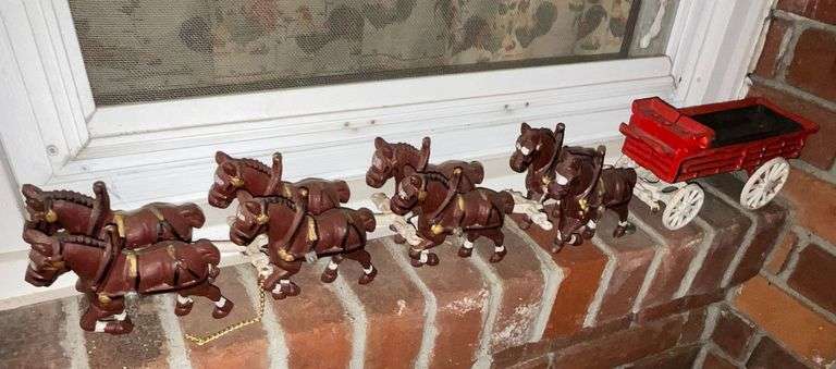 Cast iron 8-horse hitch and wagon image