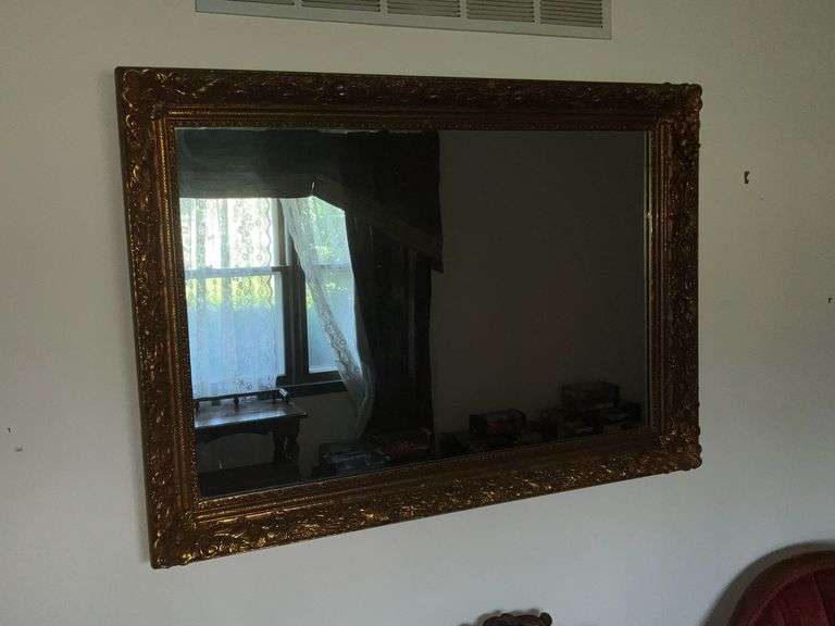 Ornate framed mirror