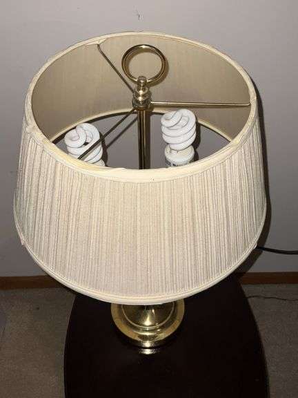 Brass based table lamp with dual bulbs