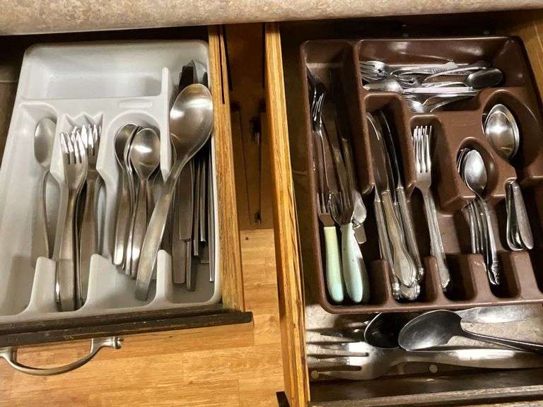 Assortment of flatware, knives image