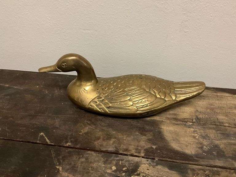 Brass duck, male & female pheasants