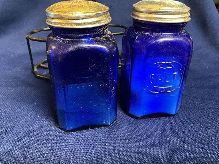Cobalt blue salt & pepper shakers in wire caddy