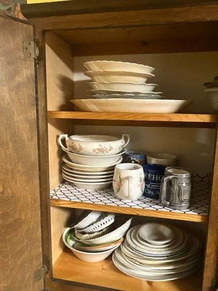 3 shelves of assorted kitchenware image