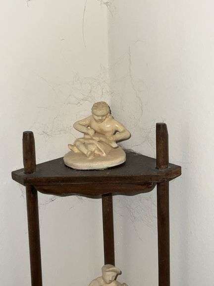 Corner curio shelf, with figurines