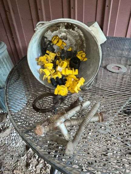 Bucket of fencing supplies