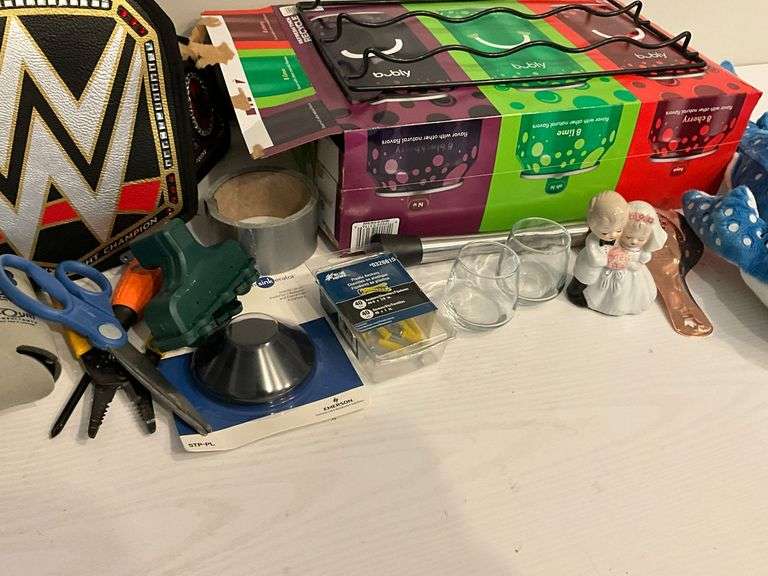 Fridge wine rack, hat, shot glasses, WWF fanny pack, etc.