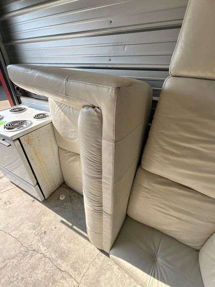 Sectional sofa, bonded leather?, cat scratch on corner