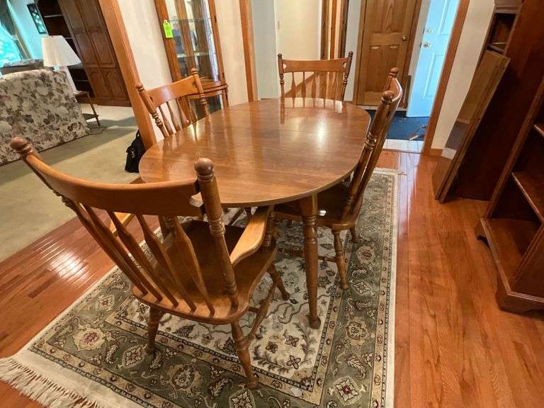 Ethan Allen dining table with (2) 15" W leaves, 38" x 56"