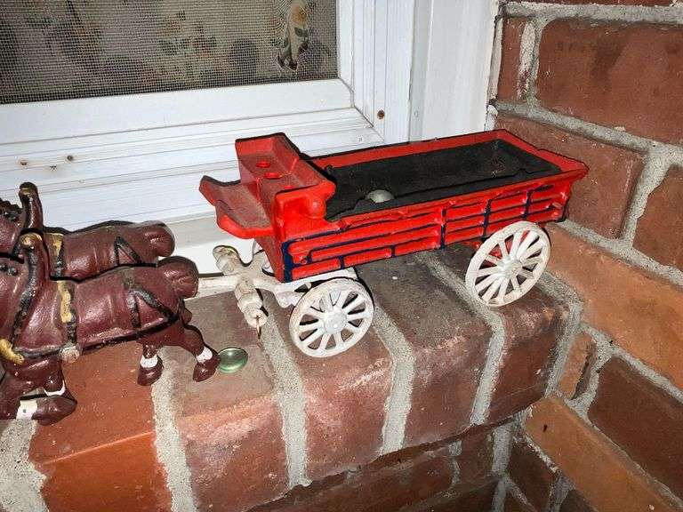 Cast iron 8-horse hitch and wagon