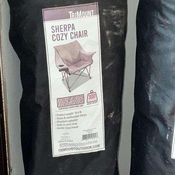 Three sherpa cozy chairs in bags
