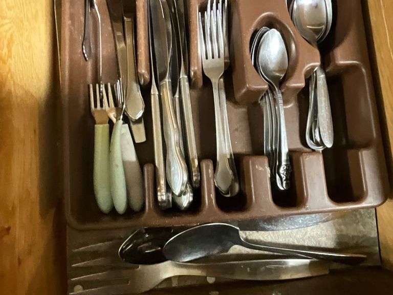 Assortment of flatware, knives