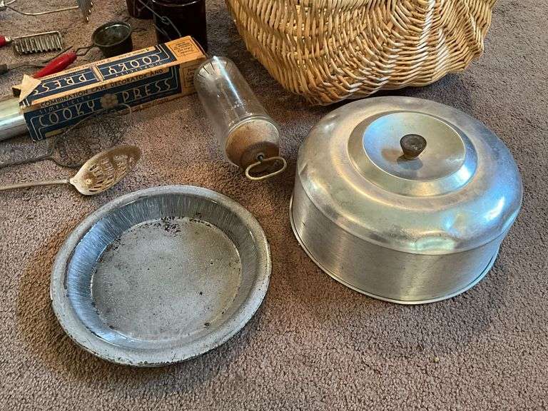Vintage kitchen utensils, strainers, crocks