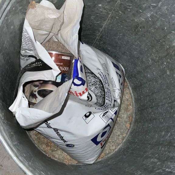 Snow shovel, rake, mop, yard sticks, trash bags, ice melt, galvanized trash can, fire extinguisher