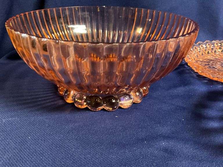 Pink Depression Glass pieces, up to 12" W