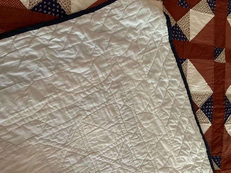 Patchwork pinwheel quilt, hand quilted