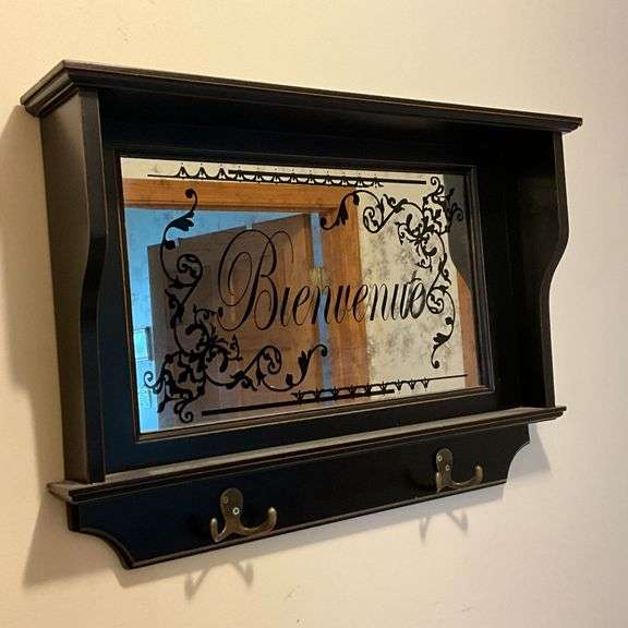Mirrored coat hook