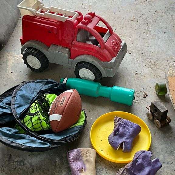 Plastic fire truck, foot ball, frisbee, skateboard, etc.