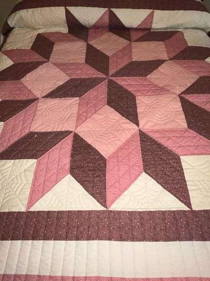Patchwork quilt, hand quilted