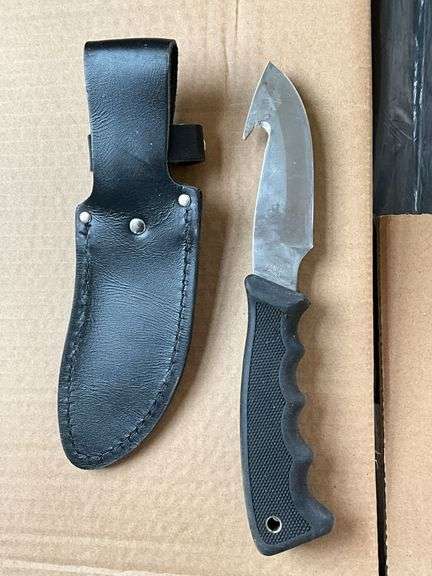 Remington skinning knife, 4" blade and leather sheath