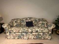 Sealy floral sofa with throw pillows
