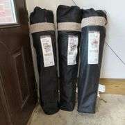 Three sherpa cozy chairs in bags