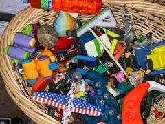 Assortment of toys, Nerf guns, cars, trucks