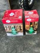 Pair of Holiday Time inflatable Christmas trees up to 7' T