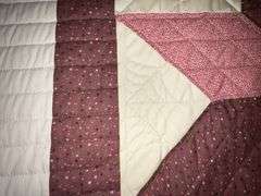 Patchwork quilt, hand quilted