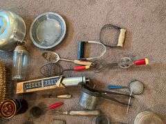 Vintage kitchen utensils, strainers, crocks